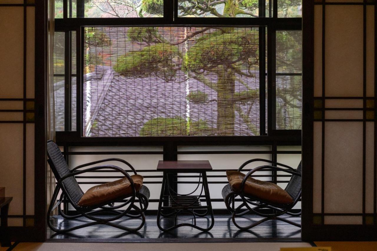 Arima Onsen Tocen Goshobo Hotel Kobe Exterior photo A shōji window